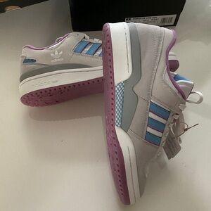 Adidas Forum White and Blue Sneakers with Purple Accents and Grey Suede Trim.